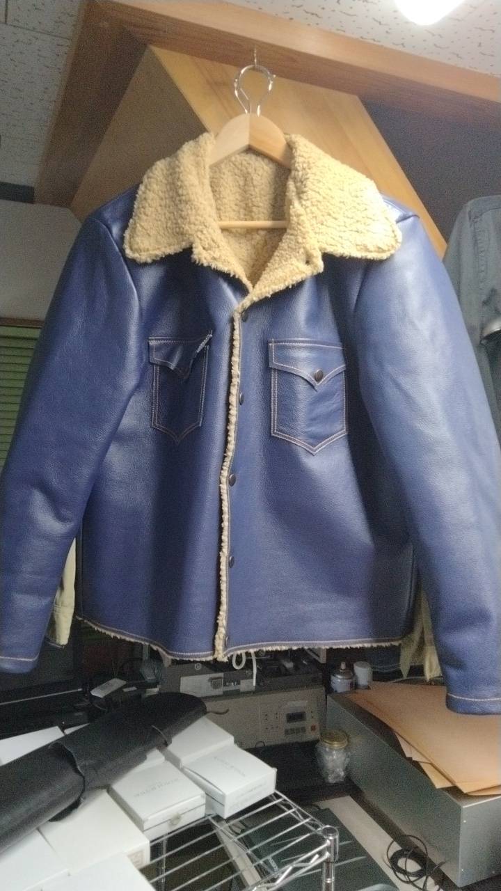 OEM blue jacket production example with boa-style collar and lining